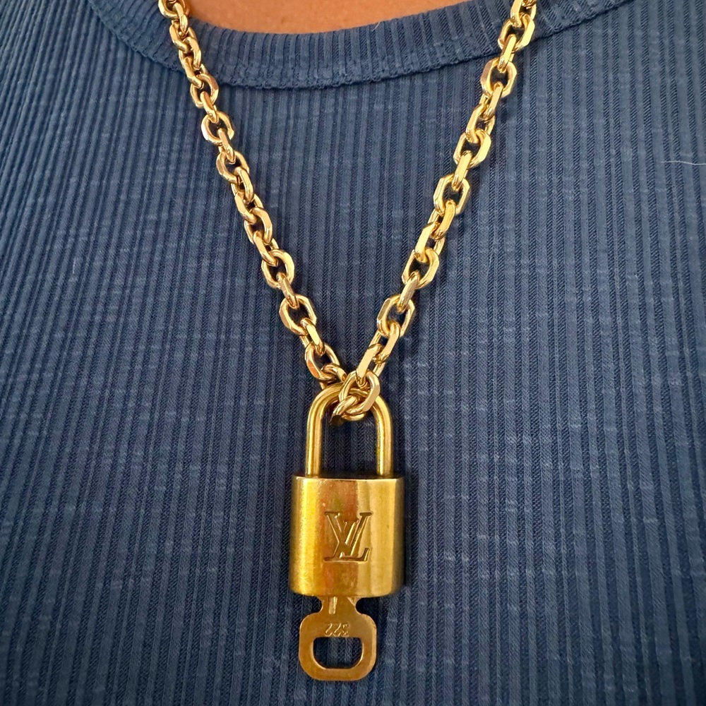Louis Vuitton lock and key.  #322